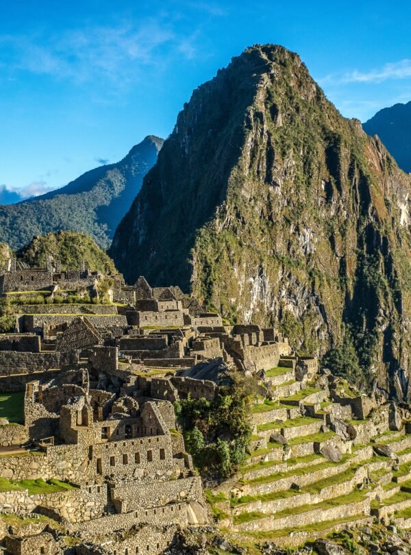 Aerial shot of the beautiful village by the mountain captured in Machu Picchu, Peru